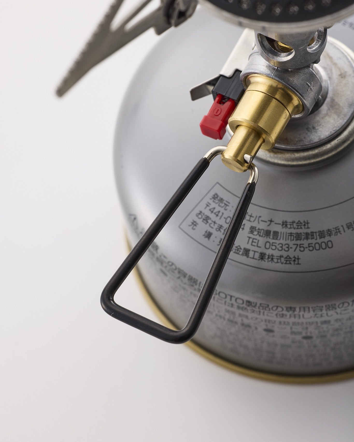公式店掲載の器具栓つまみと赤い点火スイッチの接写。両者の位置を使用前に確認します。